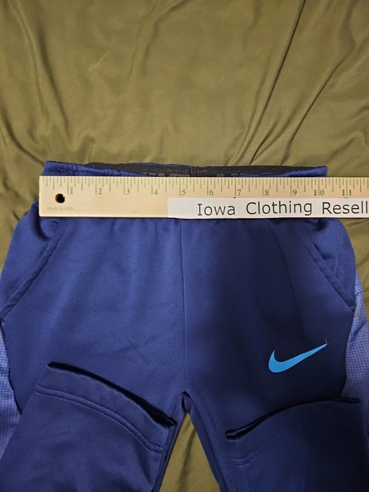 Pantalones de entrenamiento Nike DriFit polar para niños 7L (6-7 años) bolsillos azules Foto 4 de 4