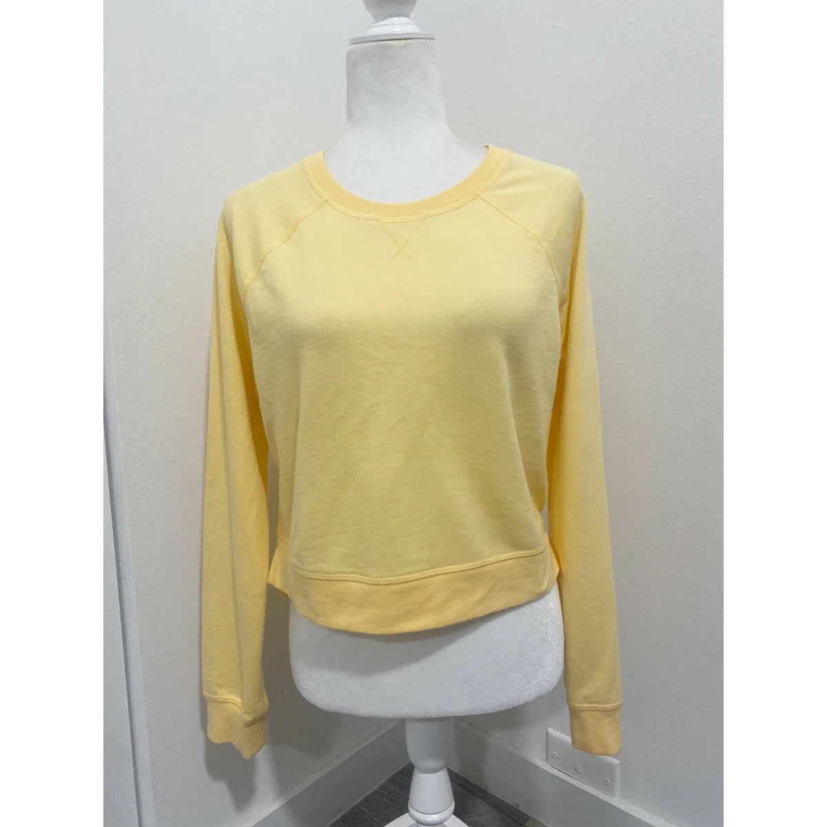 Pastel yellow sweatshirt sales