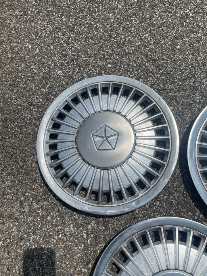 Factory 1984 to 1986 Plymouth Caravelle Voyager LeBaron 14 inch hubcaps - Image 3 of 4