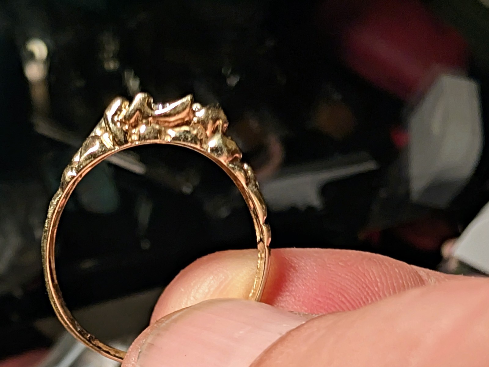 Elegant gold ring featuring multiple diamonds in … - image 2