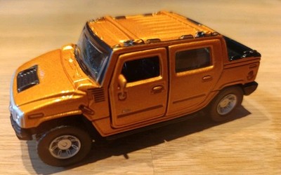 °° Maisto - Hummer H2 SUT Concept - kupfer - 1:46 - Rückziehmotor °°