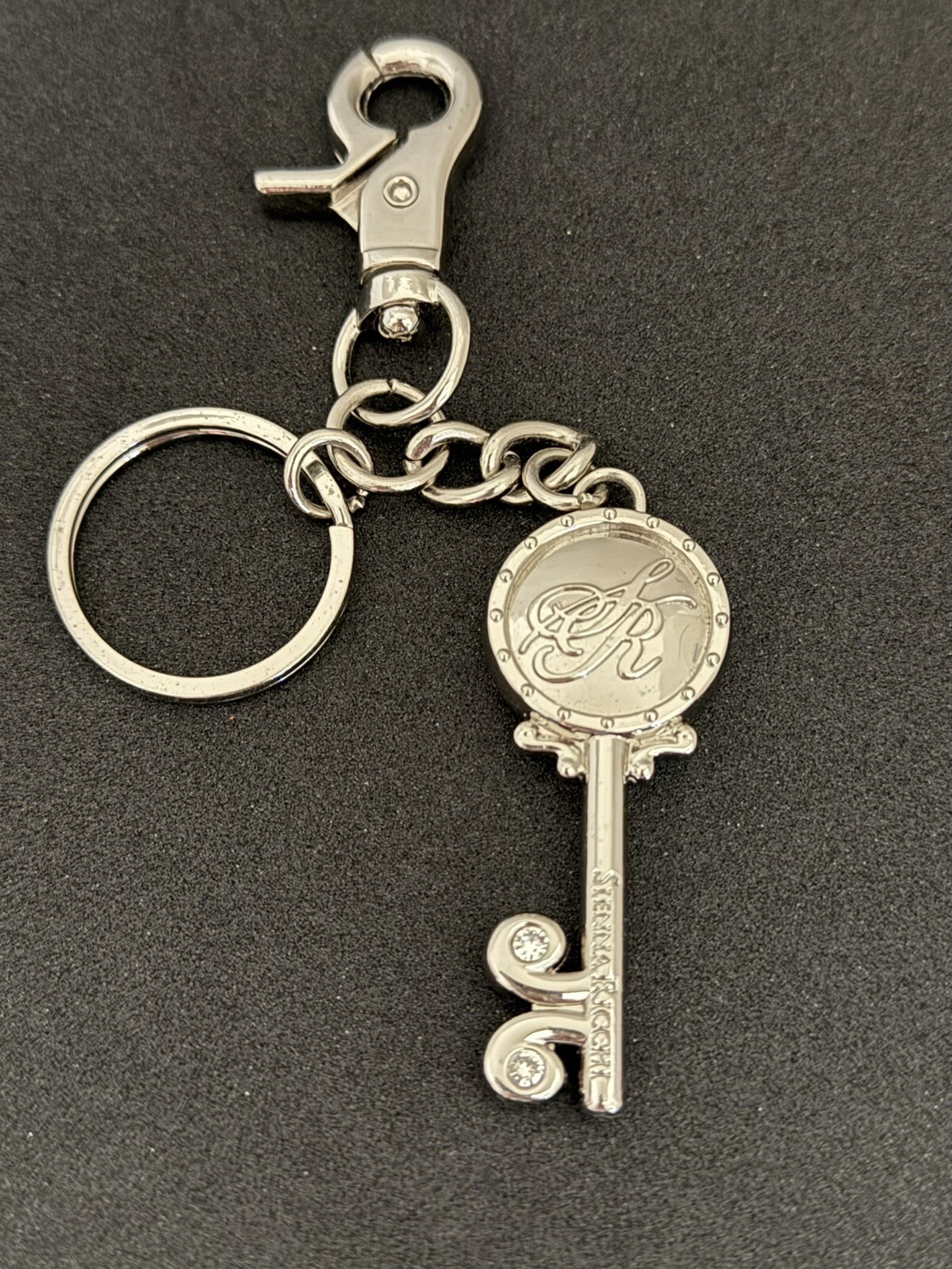 Sienna Ricchi Rhinestone Keychain Silver Tone Logo Bag Charm Keyring