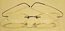 3 PIECE RIMLESS EYEGLASS FRAME  Grey Unknown Model/Brand Small Read Description