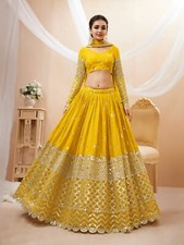 PRESENTING YELLOW HEAVY GEORGETTE LEHENGA CHOLI WITH NET DUPATTA FOR WEDDING