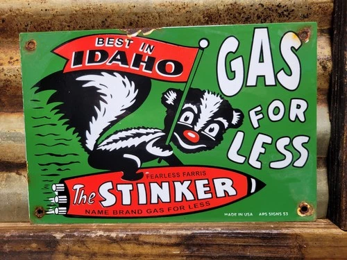 VINTAGE STINKER PORCELAIN SIGN 1953 IDAHO GAS FOR LESS SKUNK GASOLINE STATION