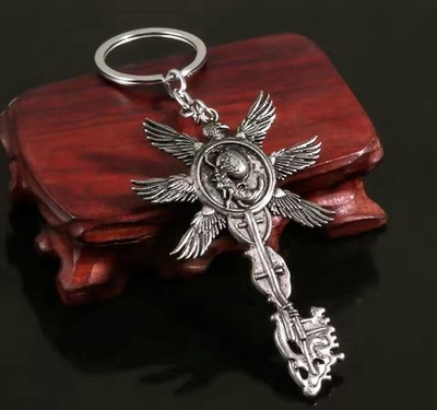 Capcom Resident Evil 8 Winged Fetus Key Schlüsselanhänger Metall 10cm Neu