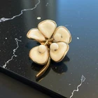 ⭐ Vintage Trifari White Milk Glass Flower Brooch – Mid-Century