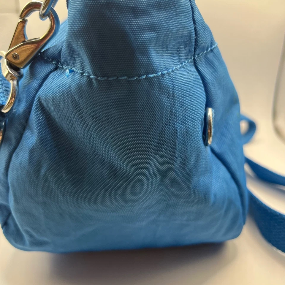Mini bolso de mano Kipling azul de nailon bandolera correa ajustable Foto 4 de 4