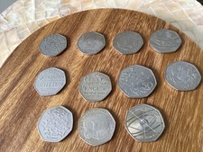 11 collectable 50 p coins . E. U. scouts . Britten Holmes