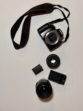 Cannon EOS Rebel T3  Cannon 50mm F/1.8 lens  Cannon Zoom Lens 28-135mm