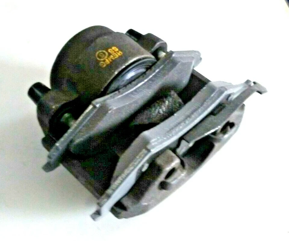 Pinza de freno de disco cargada con pastilla de freno semimetálica delantera izquierda WAGNER TQM25058   Foto 3 de 4