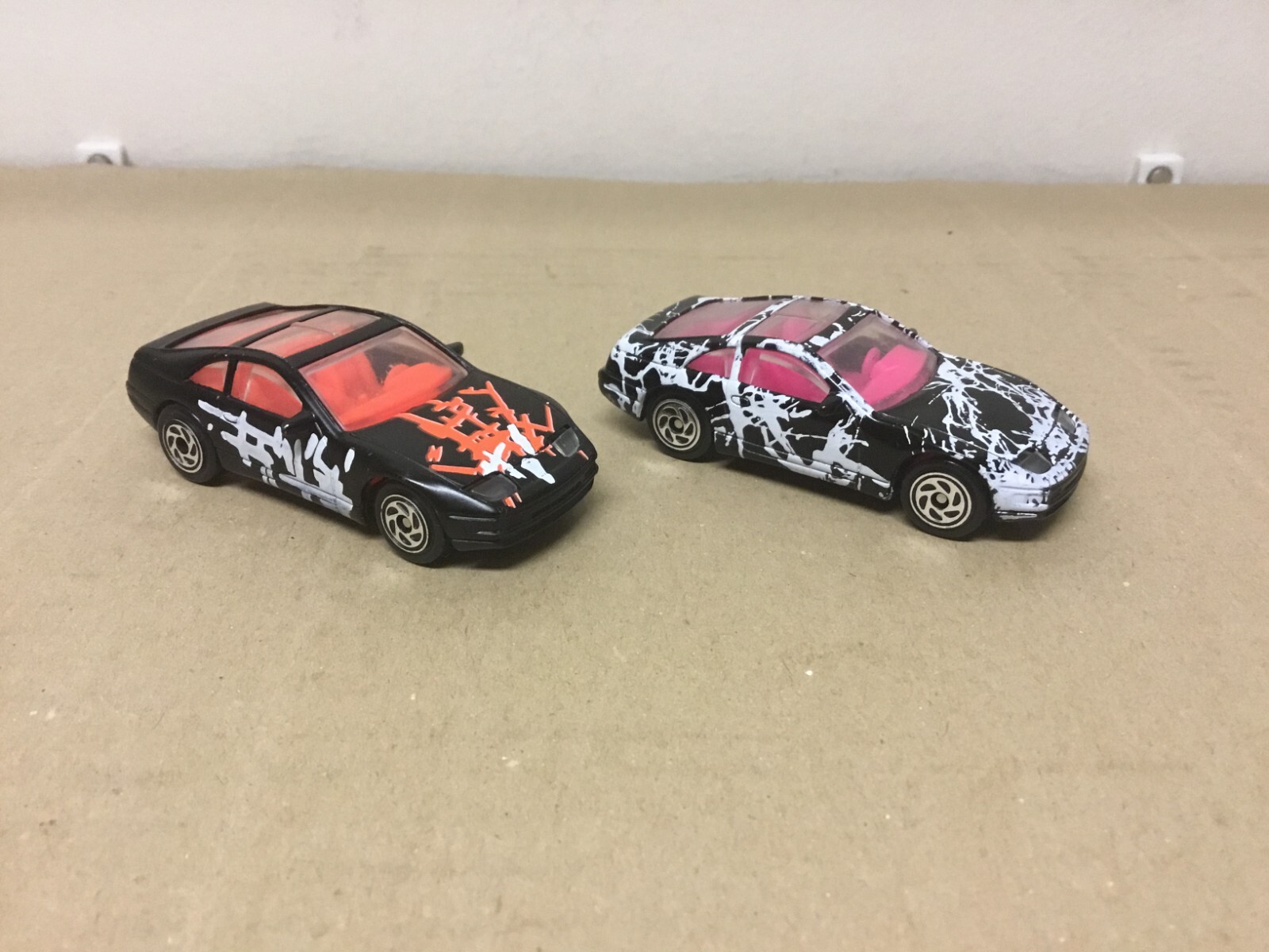 Lot of 2 - Vintage 1990 Matchbox Cars - Nissan 300 ZX Wht Splatter / Black Wht