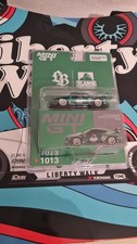 Mini GT 1:64 LXLarge verde