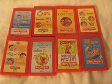 8 Story Reader cartridges, Little Mermaid, Dora, Nemo, chicken Litlte