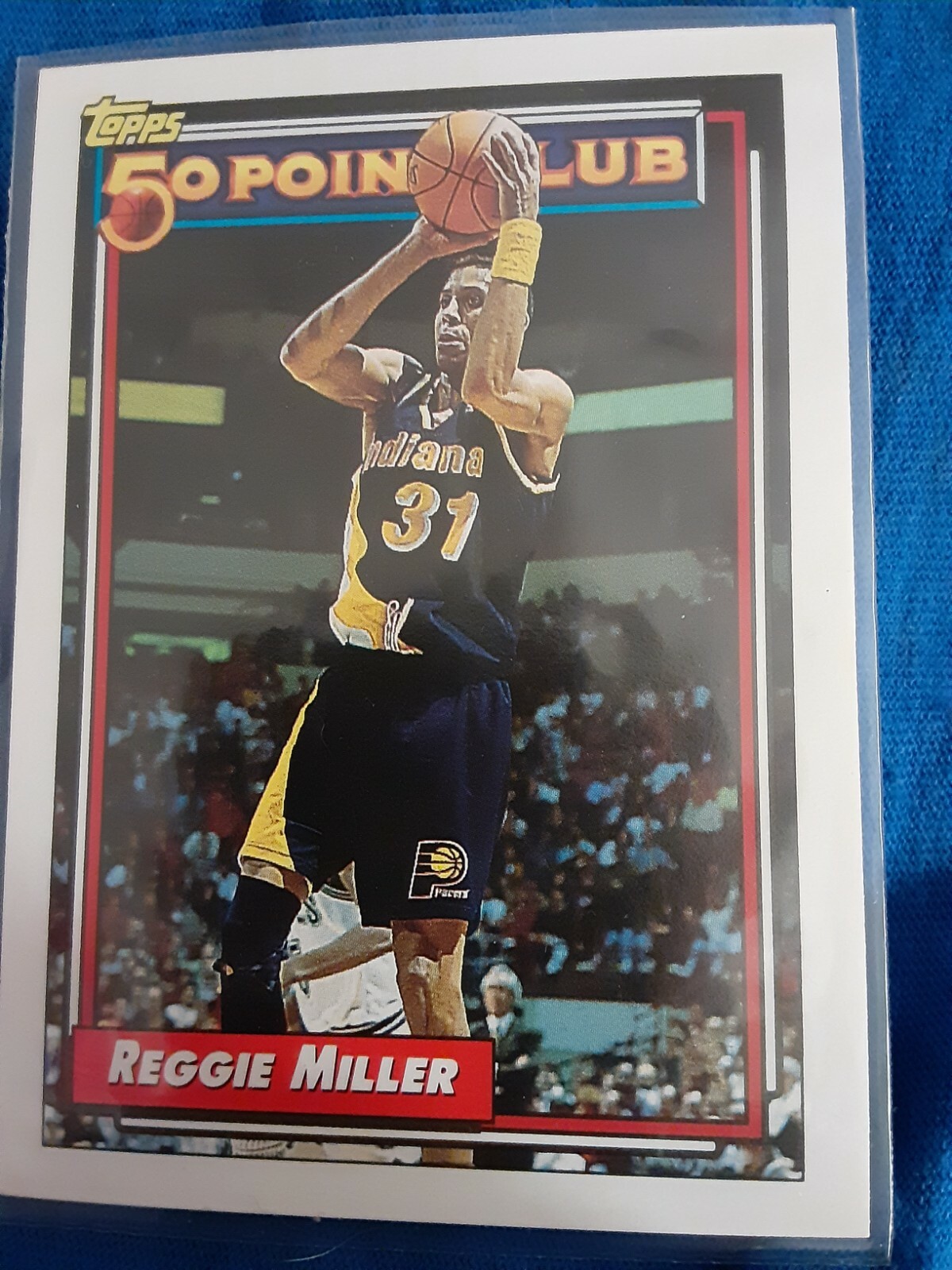 Reggie Miller #215 Basketball Cards 1992 Topps trading card — raw and PSA graded price guide