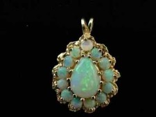 3Ct Pear Cut Lab-Created Fire Opal Women's Pendant 14K Yellow Gold Plated Silver