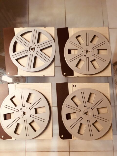 Lot of 4 - Movie reels & cases 9" inch in diameter