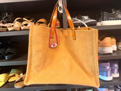 Parker Thatch medium Mimi bag in Butterscotch suede with blue interior.