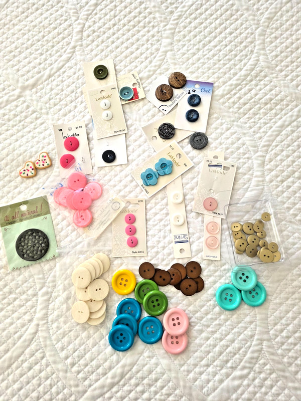 New, unused lot of plastic buttons, colors including pinks, greens, blues