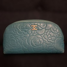 Authentic CHANEL Camellia Embossed Lambskin Coco Mark Cosmetic Pouch Blue