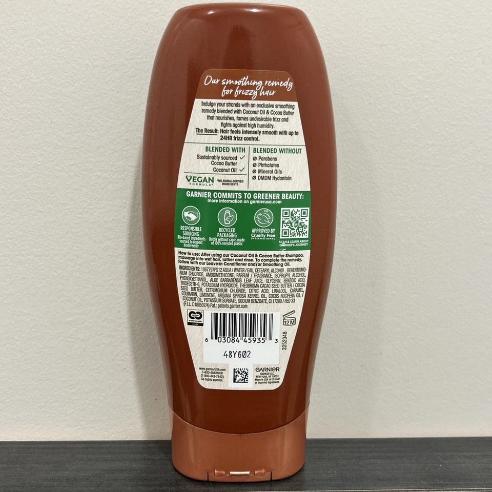 Acondicionador Garnier mezclas enteras/aceite de coco y extractos de manteca de cacao, 12,5 oz S5 Foto 3 de 3