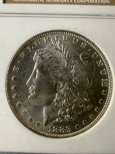1883-O $1 Morgan Silver Dollar NGC MS65 - Superb Details Lustrous Silver Tone