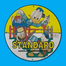 VINTAGE 1940 WALT DISNEY STANDARD GASOLINE SERVICE 4 DUCKS OIL PORCELAIN SIGN