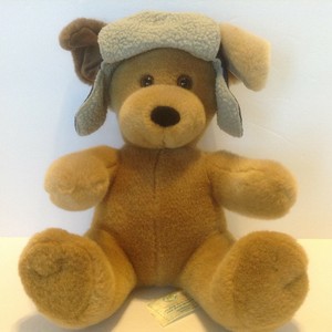 puppy inside teddy bear