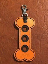 Dog Bone Joint Protector Holder. Nice item. Handy Item For Your Pool Cue Case