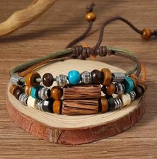 Set Di 3 Braccialetti Fantasia In Cordon, Perle In Legno E Acciaio Argentato
