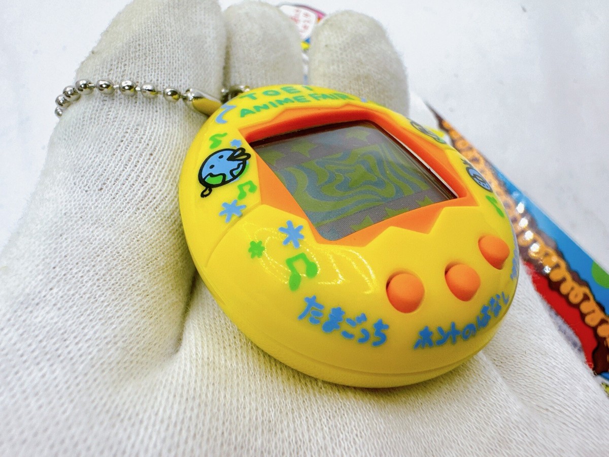 Tamagotchi TOEI Anime Fair Limited Yellow Bandai Vintage 1996 1997
