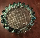 vintage Anchor Hocking "Boopie" teal glass ashtray with a bubble ball rim edge