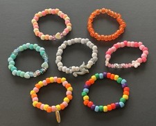 Handmade Set of 7 new Multicolor Handcrafted Beaded Bracelets with Charms