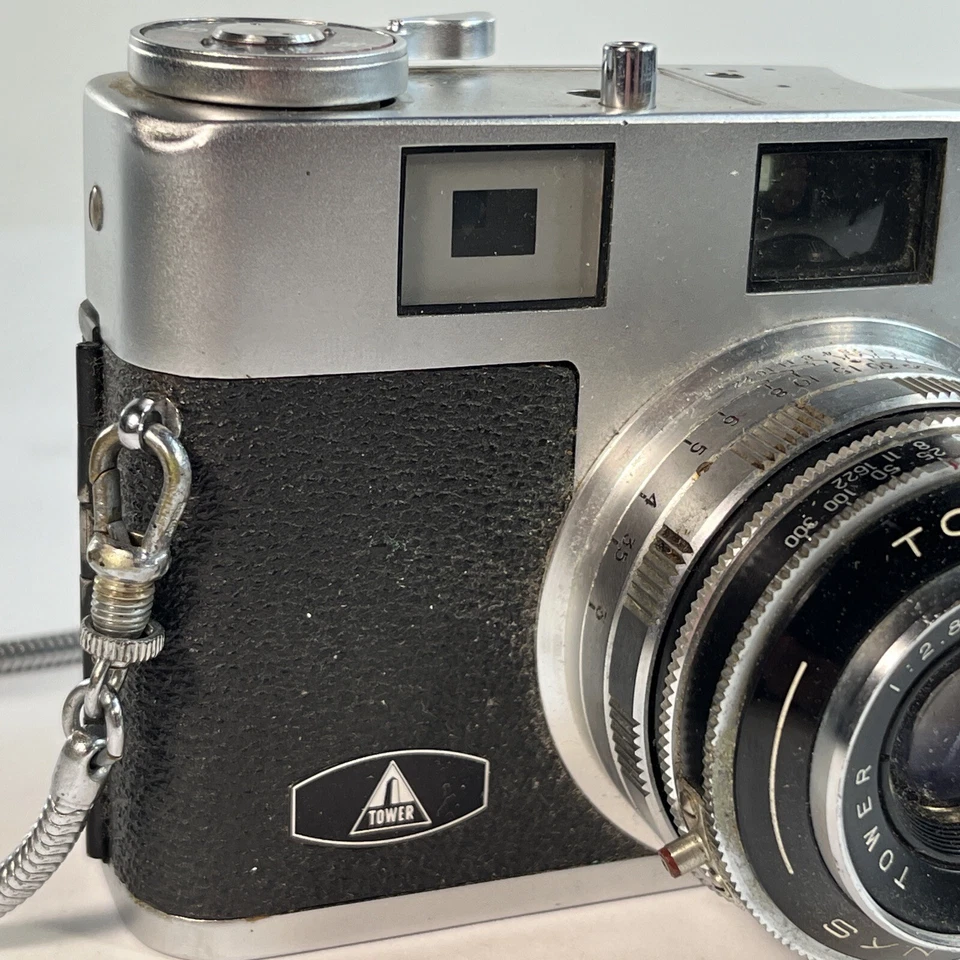 Cámara Tower 57 35mm con lente F50mm vintage sin probar se vende como está piezas reparación Foto 4 de 4