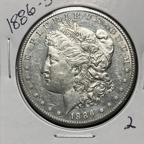 1886-S MORGAN SILVER DOLLAR, AU+ DETAILS