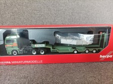 Herpa 1:87 in OVP; 318273 MAN TG-X GM Allrounder-Tieflader-Sattelzug "Max Wild"