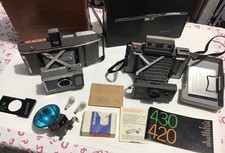 Polaroid Cameras Lot Of 2 Model 420 J66 With Extra Parts Carry Cases