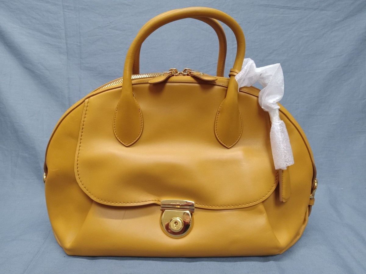Salvatore Ferragamo Fiamma Top Handle Camel Brown Calfskin Bag