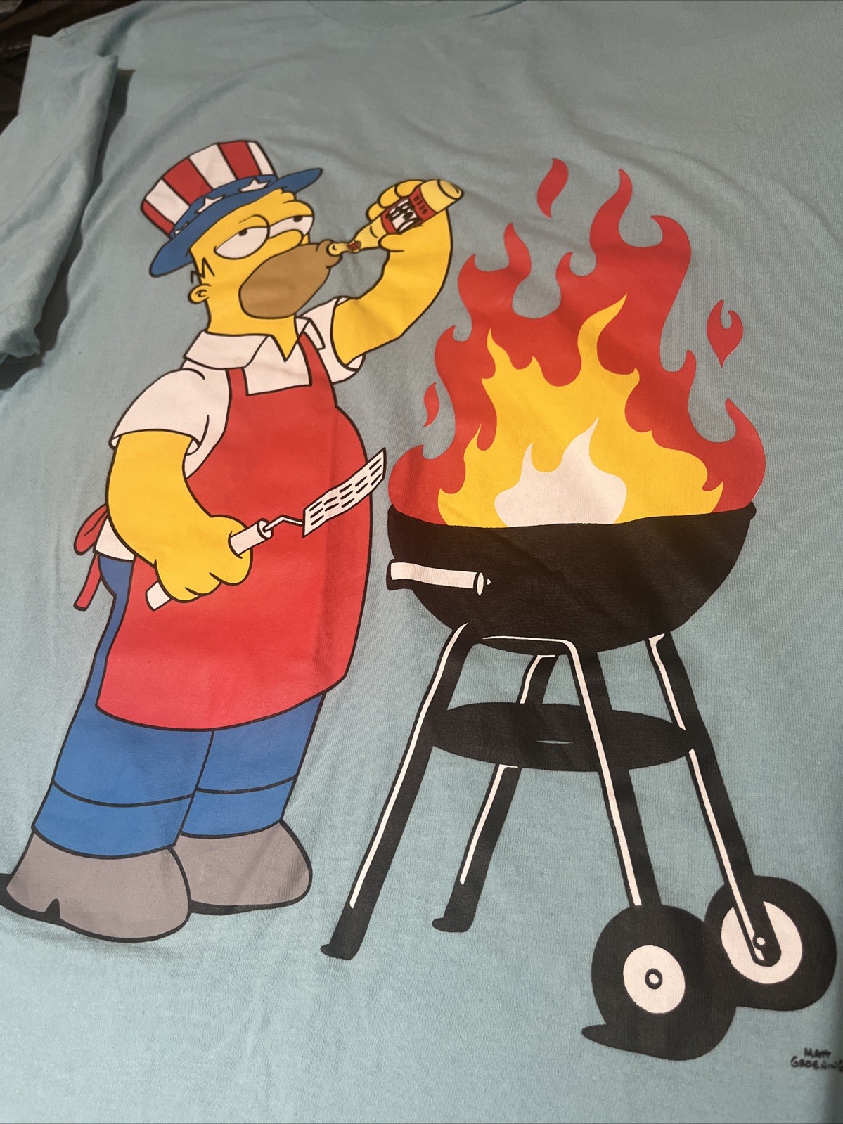 Homer Simpson Grillin` Celebrating The Fourth of July  Blue T-Shirt (XL)