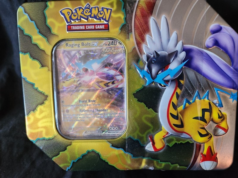 Pokemon Trading Card Game / Paradox Destinies Tin featuring Raging Bolt