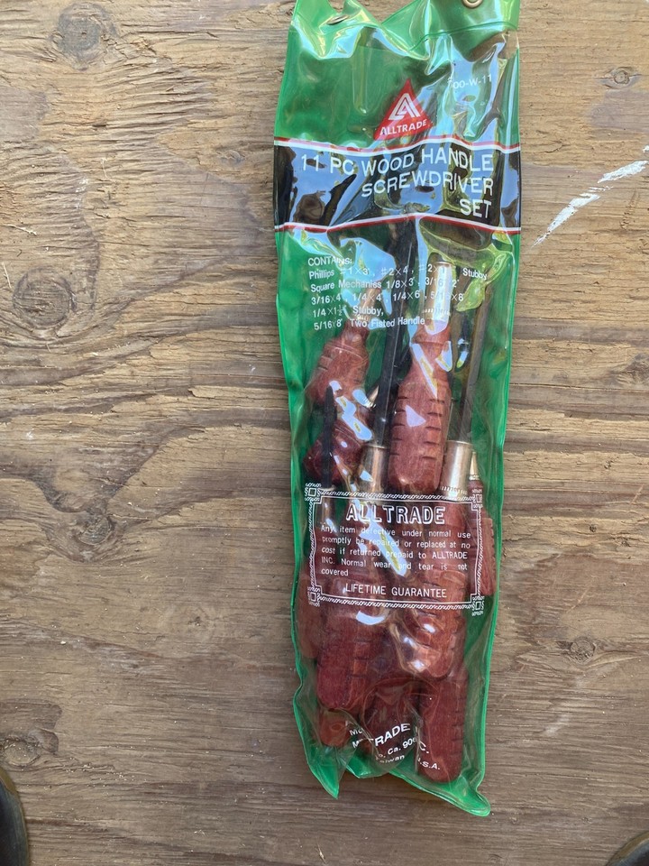 New-old-stock wood-handle screwdriver set in original pouch — the kind of satisfying, well-made toolkit that stopped being made decades ago.
