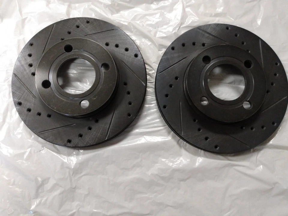 Juego de rotores de freno de disco delanteros perforados y ranurados premium (L/R) Audi Coupé 85-87 Foto 3 de 4