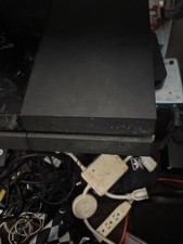 Sony PlayStation 4 (PS4) 500GB Console with DualShock 4 Controller - Jet Black