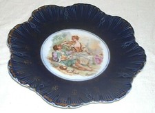 EARLY EUROPEAN POTTERY COBALT BLUE PLATE WITH SIGNED CENTRE PICTURE