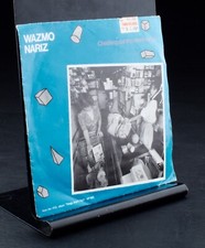 Wazmo Nariz Checking Out The Checkout Girl /Who Does It Hurt Vinyl 7" 45 RPM Wazmo Nariz Checking Out The Checkout Girl /Who Does It Hurt Vinyl 7" 45 RPM