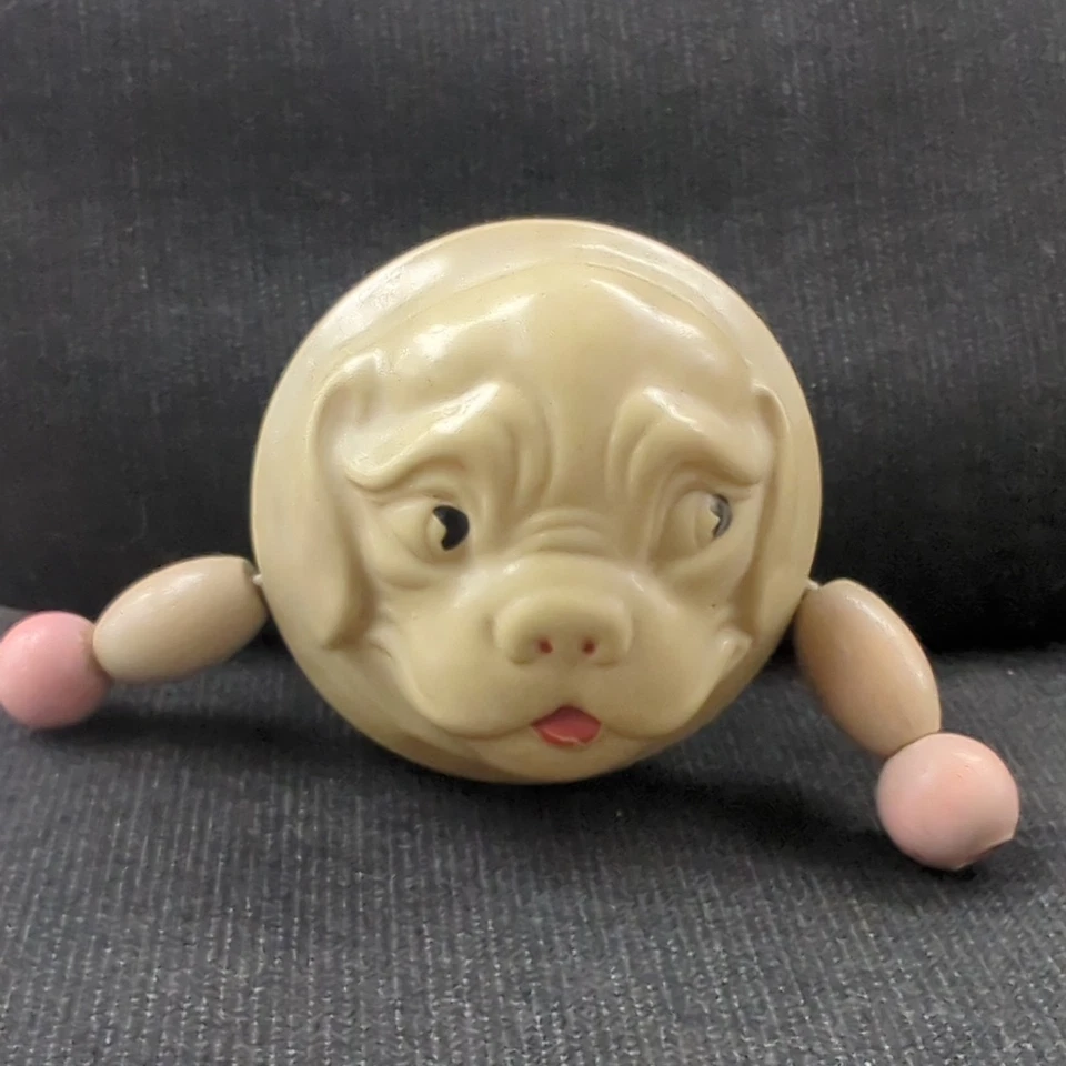 Juguete de sonajero de bebé cara de perro de celuloide de doble cara de 1920 con cuentas colgantes Foto 4 de 4