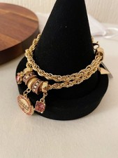 Guess Gold Tone Multi Charms Adjustable Chain Bracelet, dust bag included