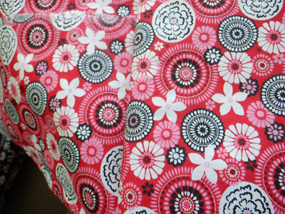 ALLOVER MODERN MEDALLIONS & FLOWERS ON RED BACKGROUND COTTON FABRIC BTY
