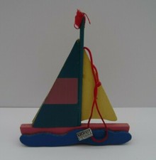 Miniature Wooden Sailing Boat Hanging Ornament. 11cm x 9cm x 1.2cm. Multicolour