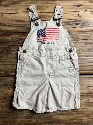 ✔️Oshkosh Tan Short Overalls with American flag Shortalls Sz Toddler Patriotic - Afbeelding 1 van 8